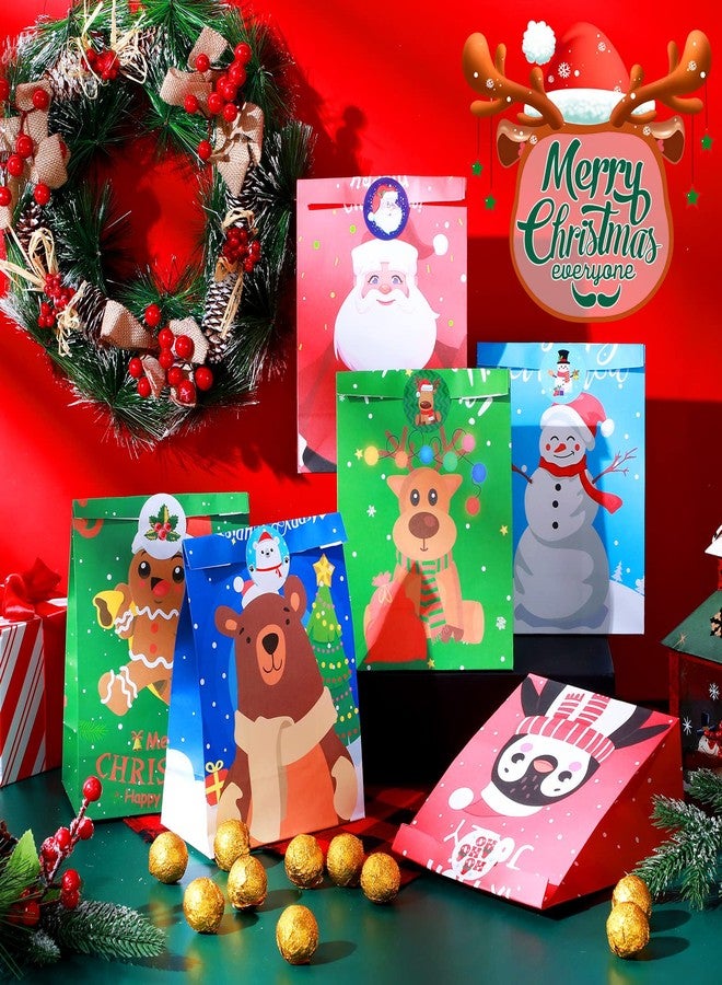 تاوباري مجموعة تاوباري من 24 كيس هدايا ورقي لعيد الميلاد مع ملصقات - أكياس رجل الثلج، وسانتا كلوز، والحلوى، والبسكويت لتوزيعات حفلات الأعياد - Image 2